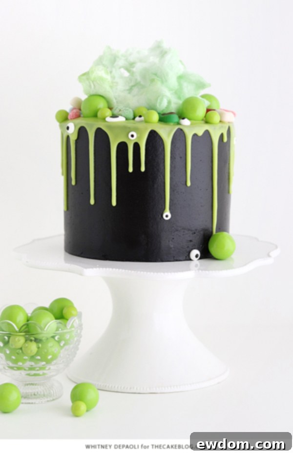 Sorceress's Potion Cake 4 Top view of the Witch Cauldron Cake showcasing candy eyeballs and green ganache