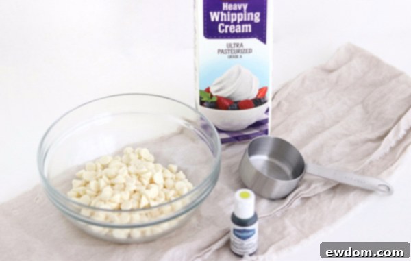 Sorceress's Potion Cake 9 Heating heavy cream for the white chocolate ganache for the cauldron cake