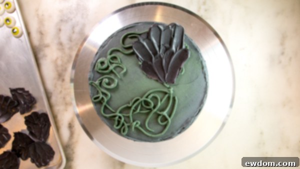 Gazing Chocolate Blossom 14 Chocolate Eyeball Flower - how to make a creepy black chocolate flower with an edible eyeball center | by Erin Gardner for TheCakeBlog.com