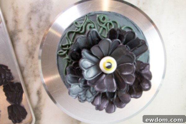 Gazing Chocolate Blossom 16 Chocolate Eyeball Flower - how to make a creepy black chocolate flower with an edible eyeball center | by Erin Gardner for TheCakeBlog.com