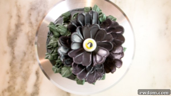 Gazing Chocolate Blossom 17 Chocolate Eyeball Flower - how to make a creepy black chocolate flower with an edible eyeball center | by Erin Gardner for TheCakeBlog.com