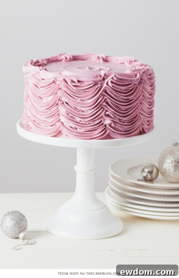 Enchanted Hazelnut Nutcracker Cake 10 A beautifully presented slice of Hazelnut Nutcracker Cake on a festive plate.