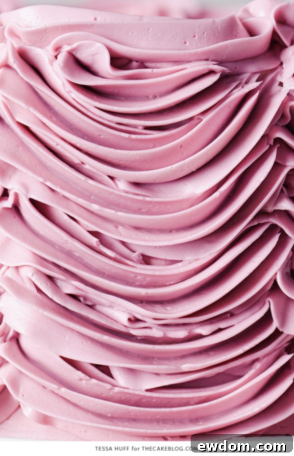 Enchanted Hazelnut Nutcracker Cake 4 A delicious slice of Hazelnut Nutcracker Cake, showcasing the fluffy cake and creamy praline buttercream.