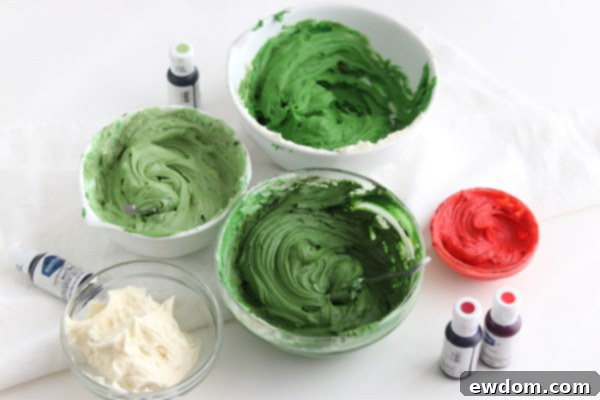 Festive Wreath Cupcakes 9 Bowls of buttercream showing different shades of green and red