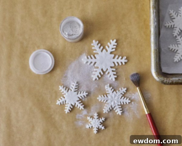 Enchanted Snowflake Cake 10 Dusting fondant snowflakes with Super Pearl luster dust for shimmer