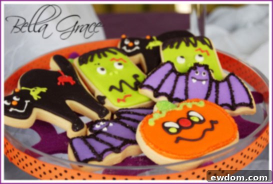 Exquisitely decorated Halloween Cookies, showcasing intricate designs perfect for a party favor.