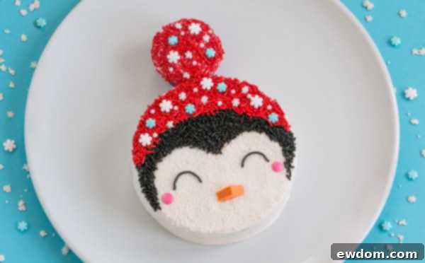 Tuxedo Treat 16 Finished sprinkle coated penguin cake