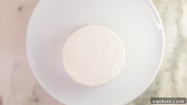 Tuxedo Treat 6 Smooth buttercream layer on the cake