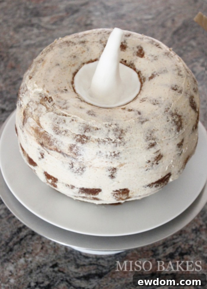Autumn Hearth Pumpkin Bundt 7 Crumb coated pumpkin cake, ready for final decoration with Swiss Meringue Buttercream