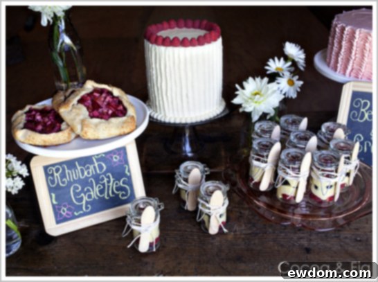 Full Dessert Display Rustic Dessert Table with Cake Trio and Mini Desserts