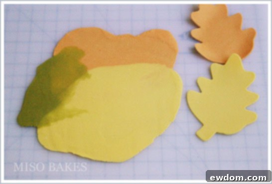 Autumn Leaves Wreath Cake - Shaping fondant leaves on a rolling pin