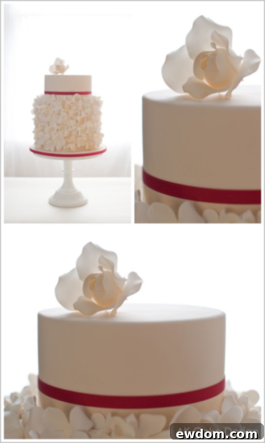 Side View of Snowy White Winter Wedding Cake with Red Ribbon