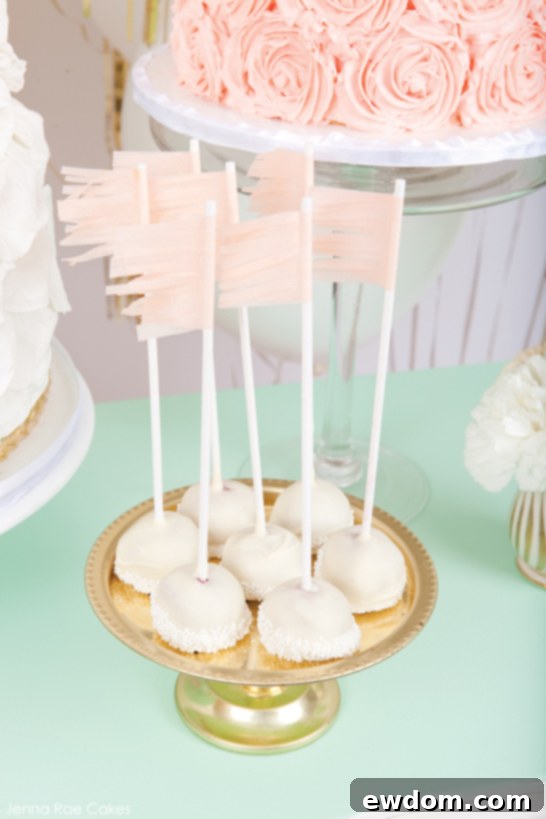 Close-up of Ombre Peach Cake with Buttercream Rosettes and Mint Accents