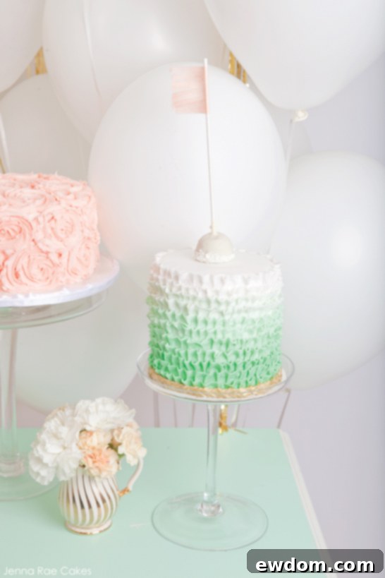Detailed view of Romantic Dessert Table with Peach and Mint Cakes